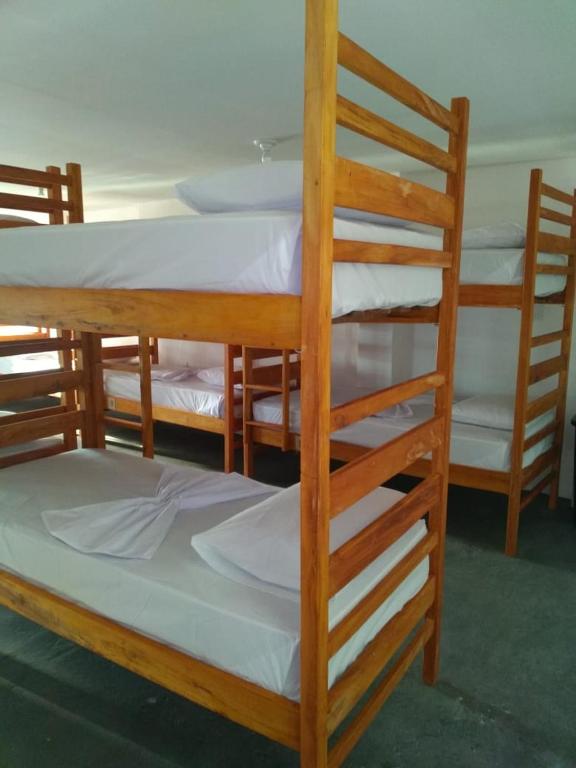 Postel nebo postele na pokoji v ubytování Manhatã Hostel