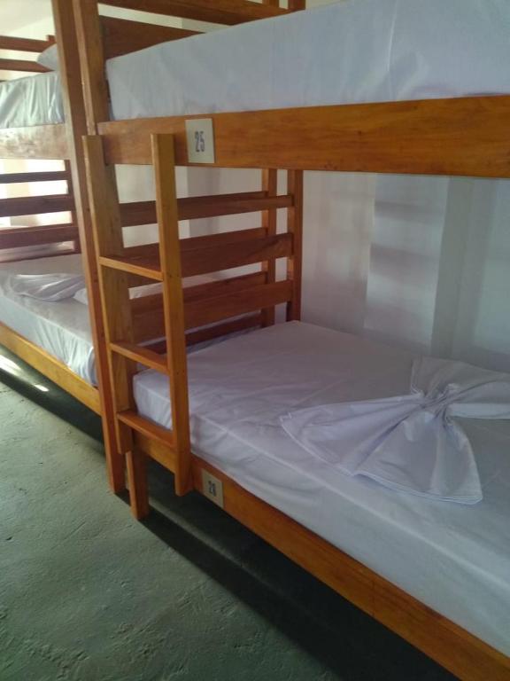 Postel nebo postele na pokoji v ubytování Manhatã Hostel