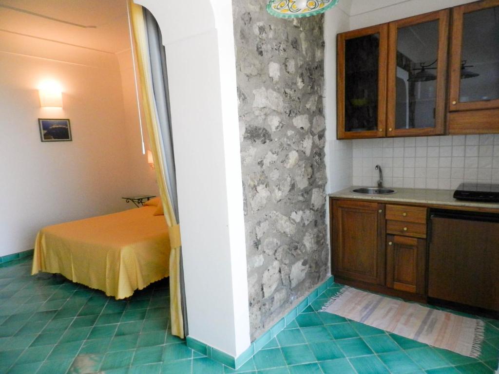 Kuchyň nebo kuchyňský kout v ubytování Bacio del Sole B&B Positano