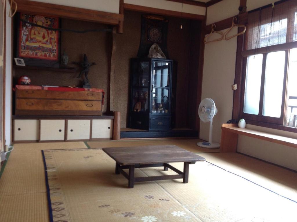Fotografie z fotogalerie ubytování Buddha Guest House v destinaci Tanabe
