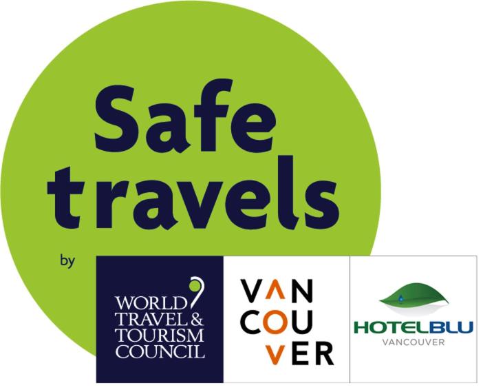 a sign that says safe travels with three different logos at Hotel BLU in Vancouver