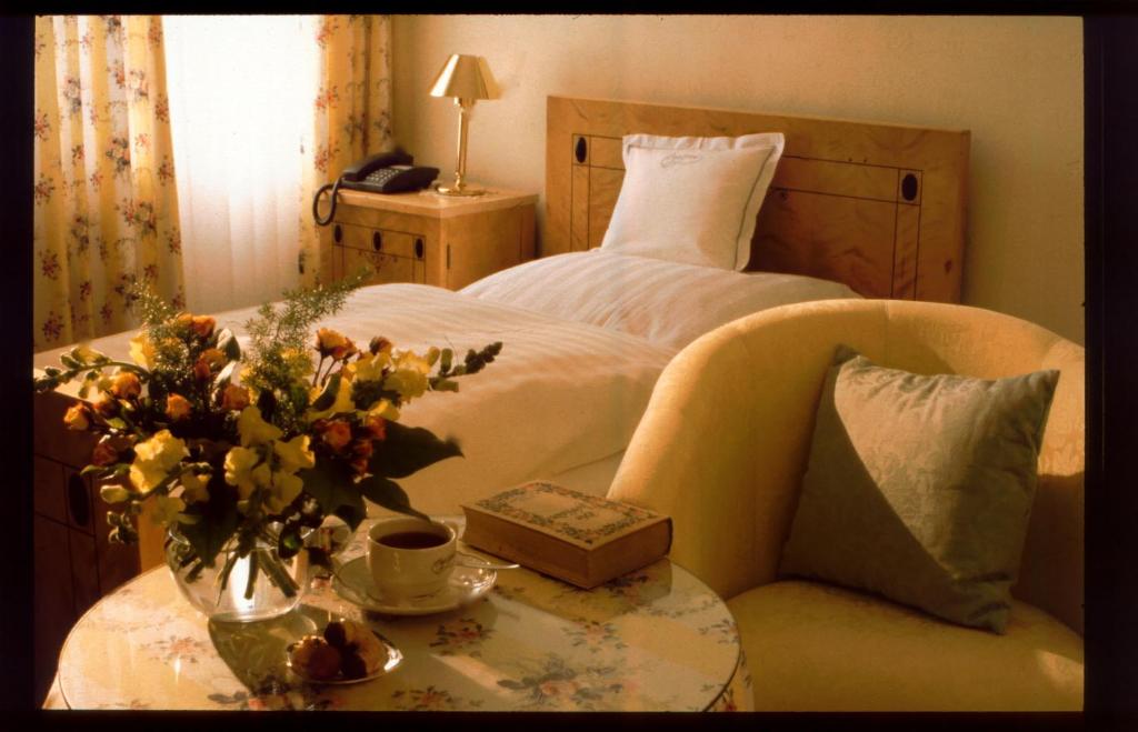 Postel nebo postele na pokoji v ubytování Unser kleines Hotel Café Göbel