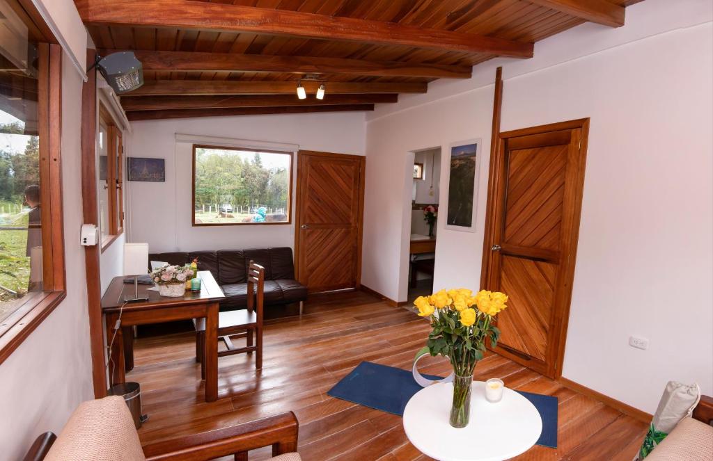 Posezení v ubytování Hosteria Papagayo Cotopaxi