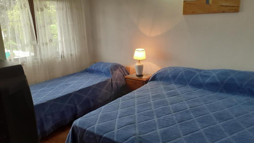 En eller flere senge i et værelse på Amaneceres en Punta mogotes