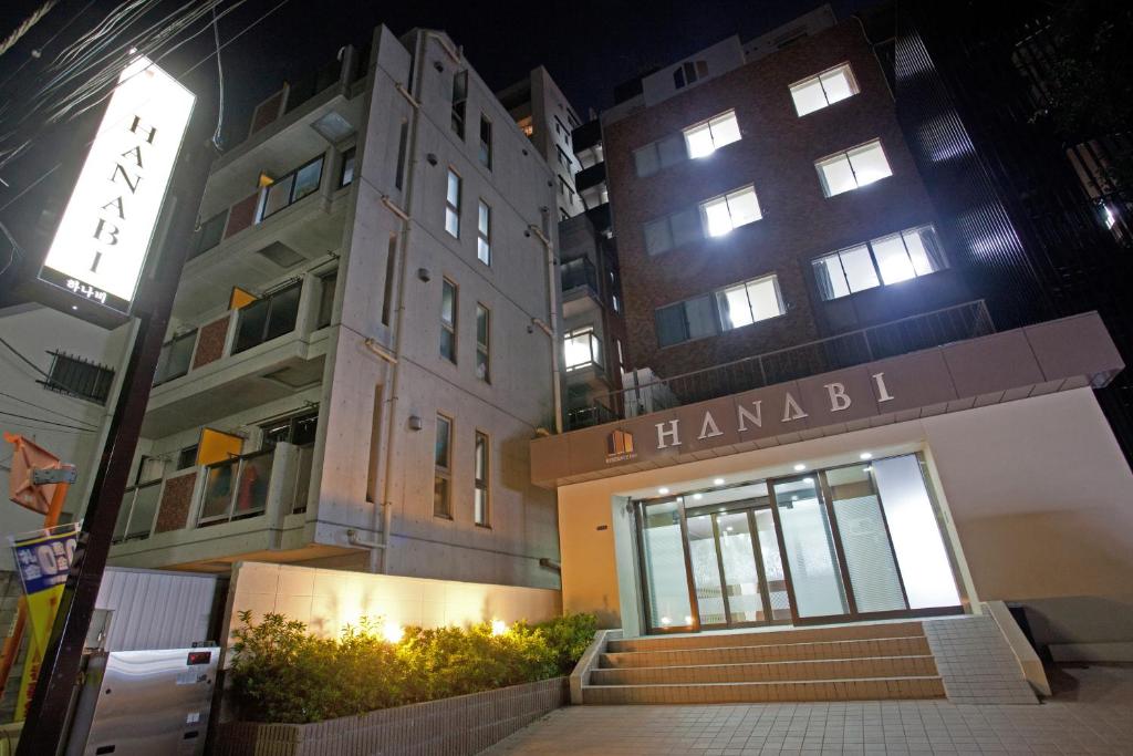 a building with a sign that reads hanbok at Hanabi Hotel in Tokyo