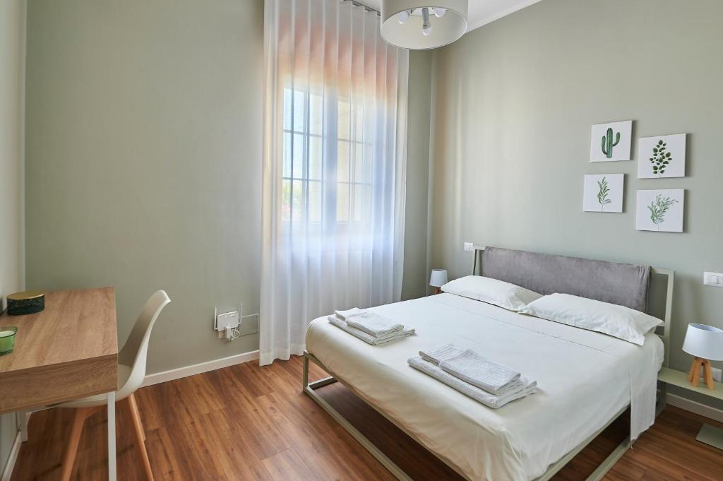 Postel nebo postele na pokoji v ubytování Lapilanoa - Suite & Pool