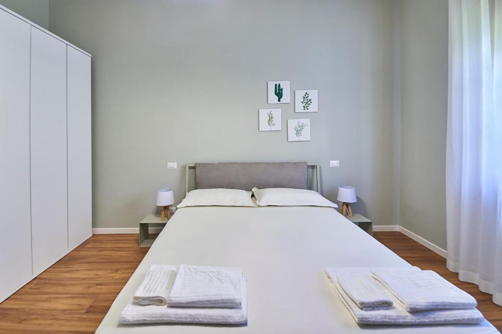 Postel nebo postele na pokoji v ubytování Lapilanoa - Suite & Pool