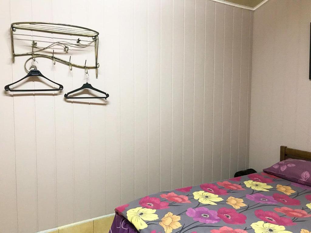Postel nebo postele na pokoji v ubytování Sun