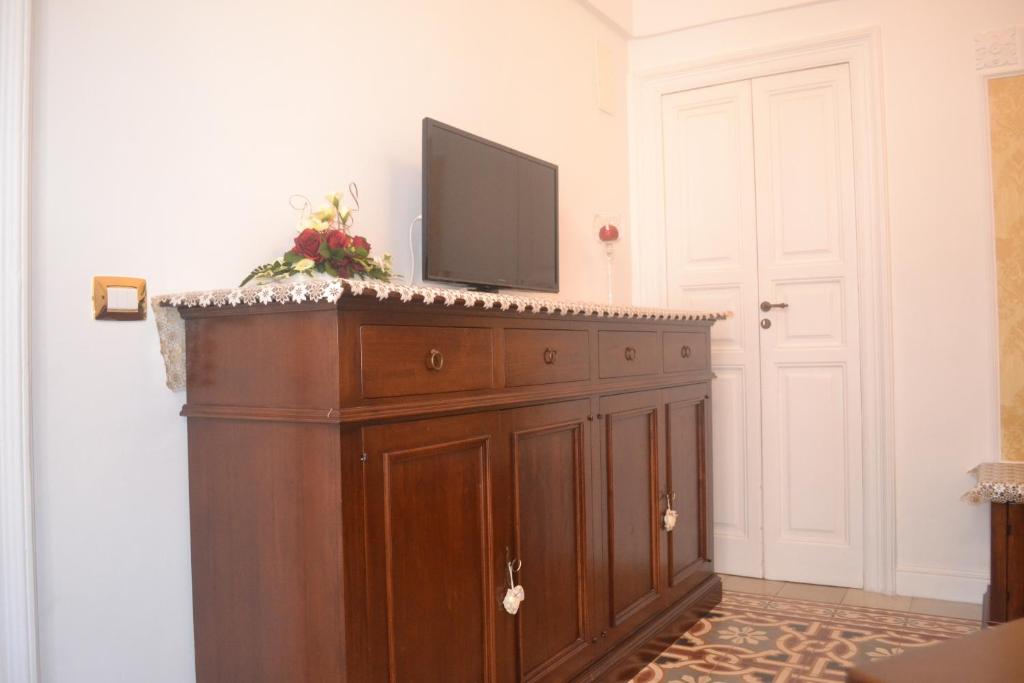 Televízia a/alebo spoločenská miestnosť v ubytovaní Vintage Home