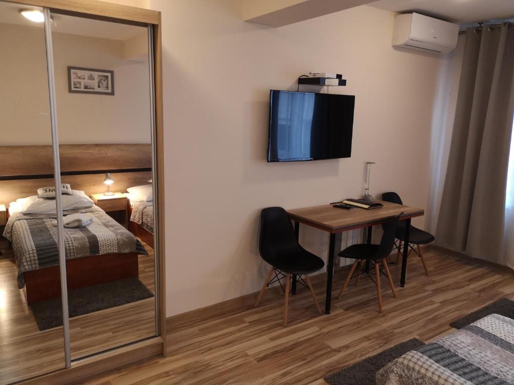 Posteľ alebo postele v izbe v ubytovaní Hotel 1