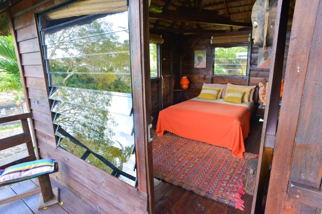 Postel nebo postele na pokoji v ubytování Tree Lodge Mauritius