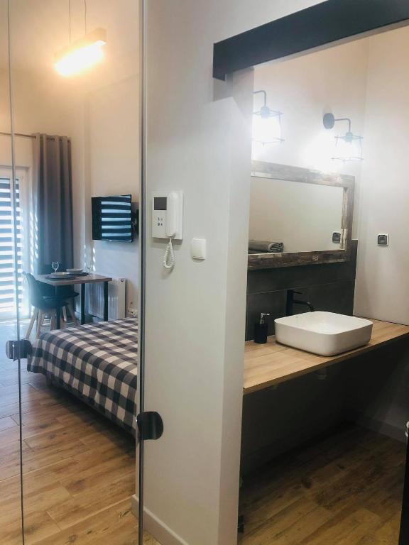 Kuchyň nebo kuchyňský kout v ubytování Property Apart - Soft Lofty Legnicka Centrum