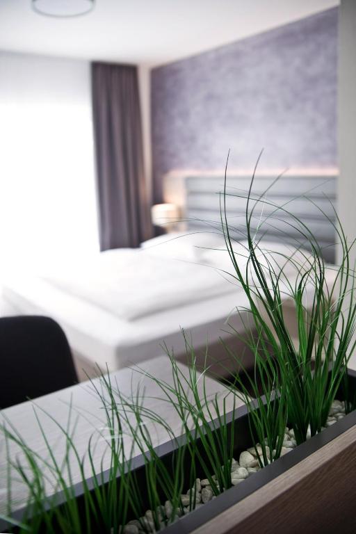 Postel nebo postele na pokoji v ubytování Hotel Rieth