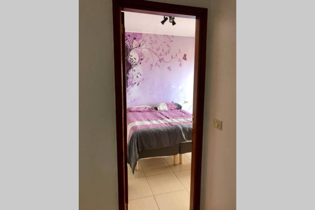Posteľ alebo postele v izbe v ubytovaní Casa con piscina privada. Mirador de Humbolt.