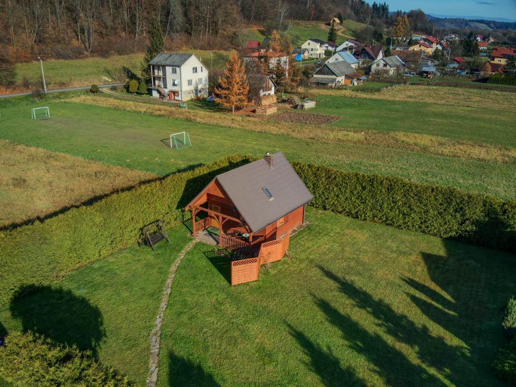 an aerial view of a small house in a field at Domek pod Czulnią in Uherce Mineralne (7)