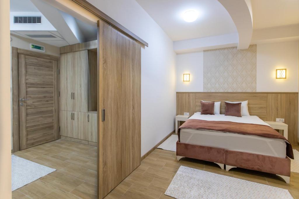 Postel nebo postele na pokoji v ubytování Aqua Spa Termale