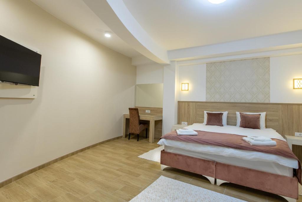 Postel nebo postele na pokoji v ubytování Aqua Spa Termale