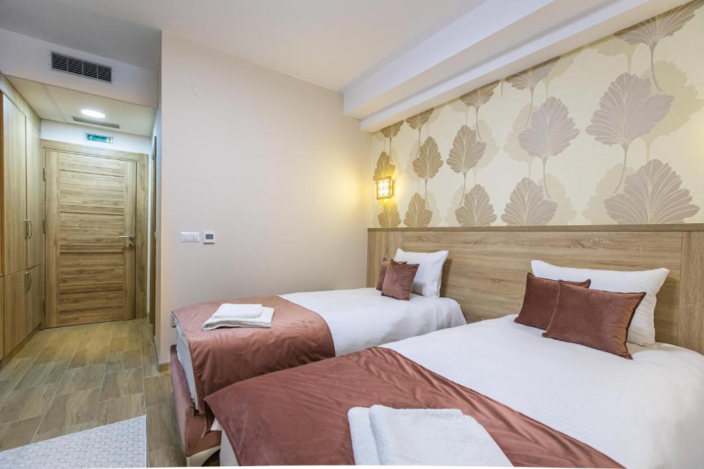 Postel nebo postele na pokoji v ubytování Aqua Spa Termale