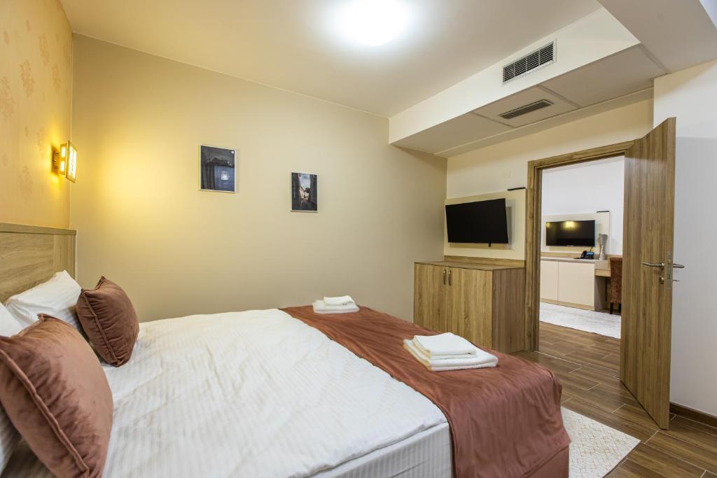 Postel nebo postele na pokoji v ubytování Aqua Spa Termale