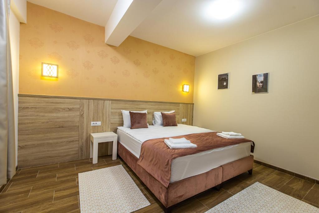 Ένα ή περισσότερα κρεβάτια σε δωμάτιο στο Aqua Spa Termale