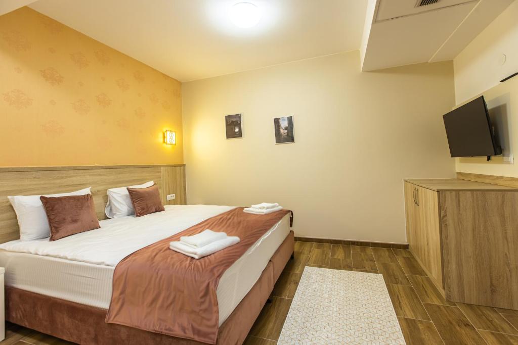 Postel nebo postele na pokoji v ubytování Aqua Spa Termale
