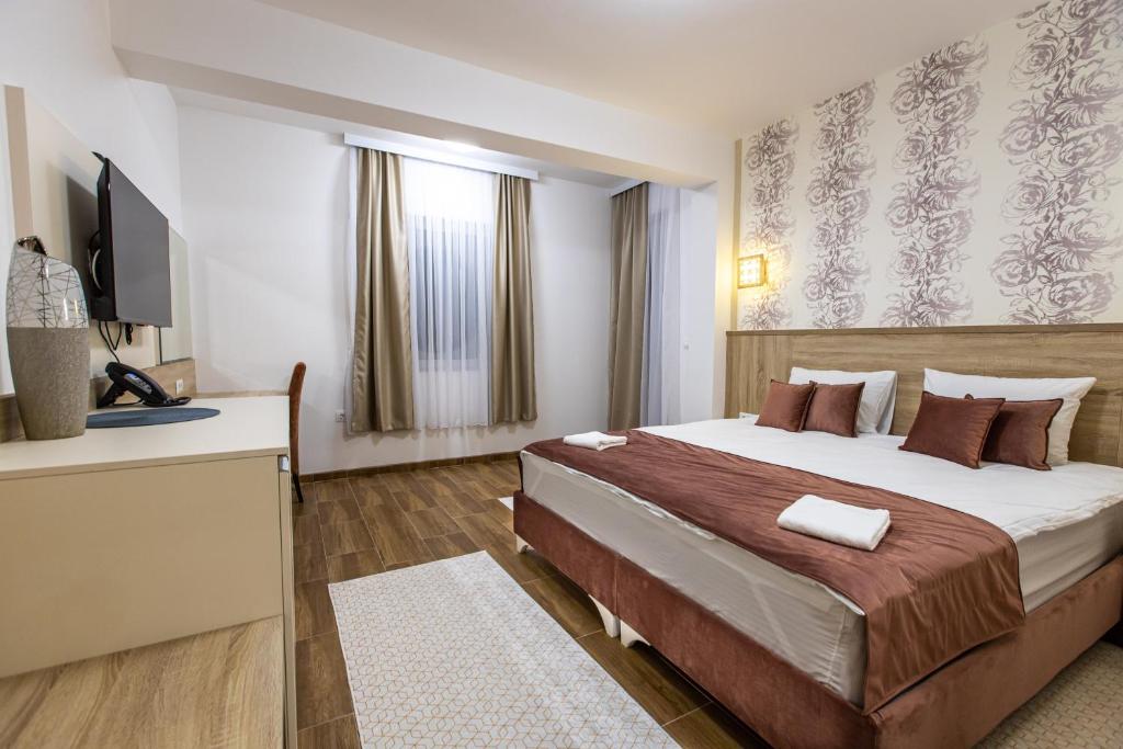 Postel nebo postele na pokoji v ubytování Aqua Spa Termale