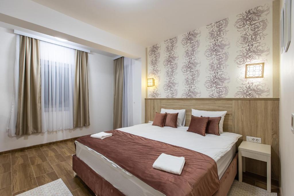 Postel nebo postele na pokoji v ubytování Aqua Spa Termale