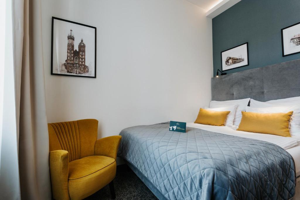 Posteľ alebo postele v izbe v ubytovaní Hotel 32 Kraków Old Town