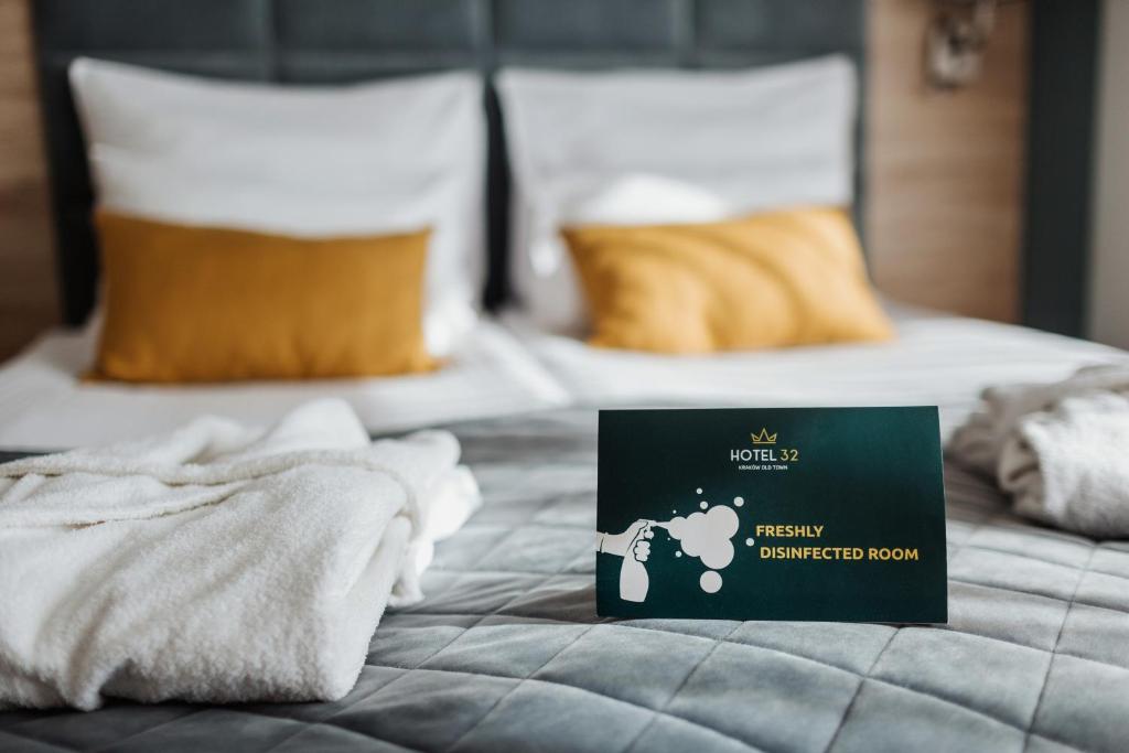 Posteľ alebo postele v izbe v ubytovaní Hotel 32 Kraków Old Town