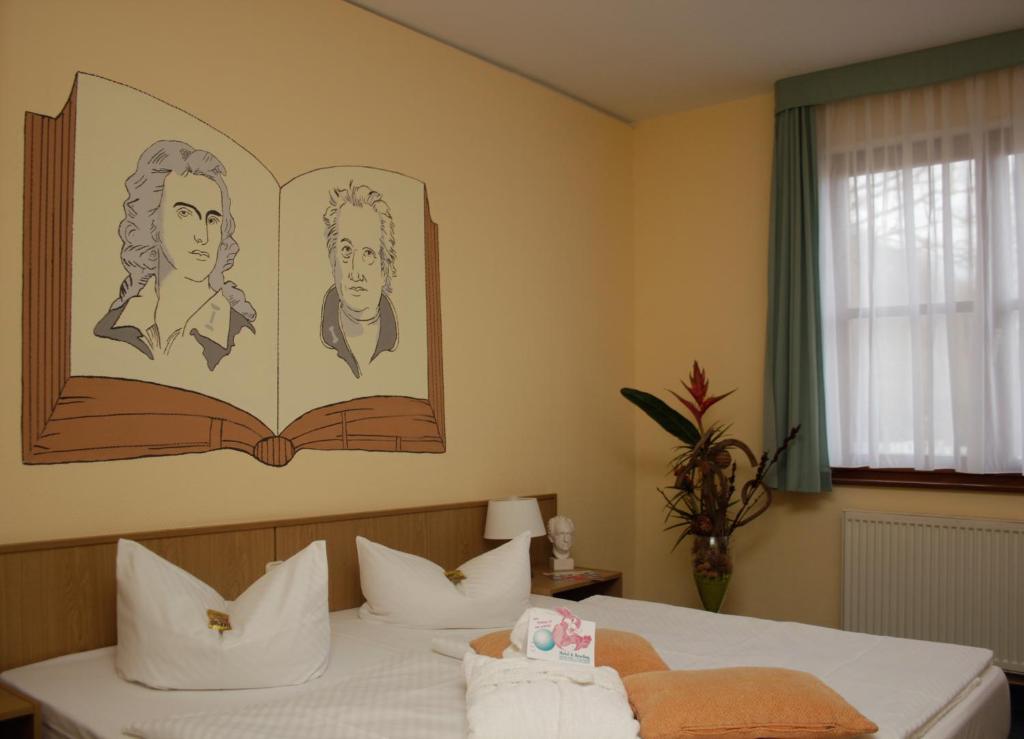 Voodi või voodid majutusasutuse Jembo Park Hotel toas