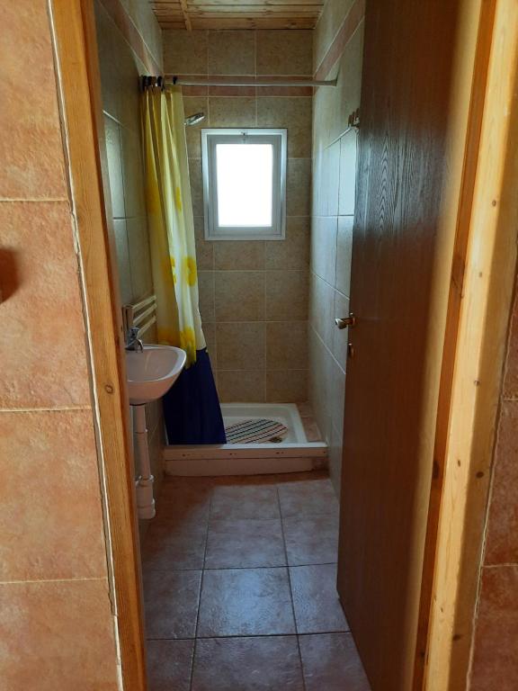 Koupelna v ubytování Sapir Apartment