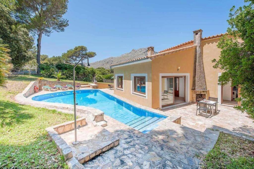 Bazén v ubytovaní Villa Alexandria Cala San Vicente 300m from the beach alebo v jeho blízkosti