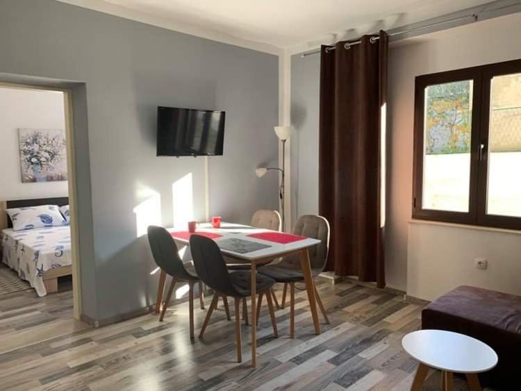 Televízia a/alebo spoločenská miestnosť v ubytovaní Fresh Apartments Dar Orlic