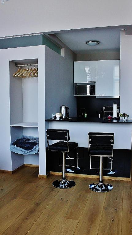 Kuchyň nebo kuchyňský kout v ubytování B&B Avenue Deschanel