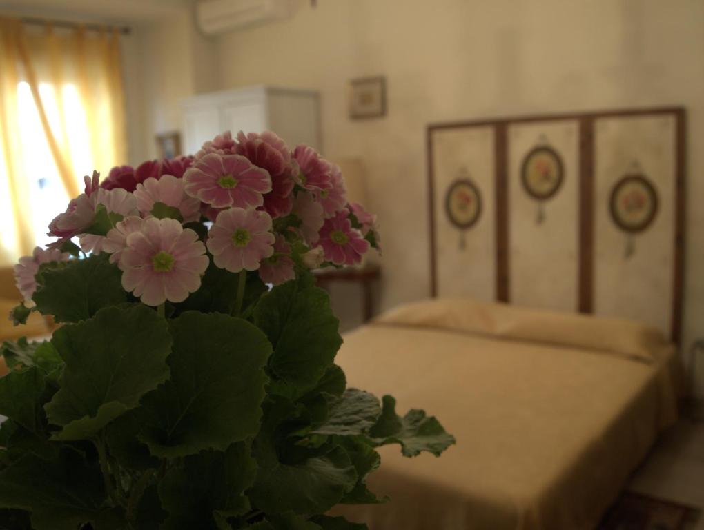 Posteľ alebo postele v izbe v ubytovaní B&B All'Ombra di San Pietro