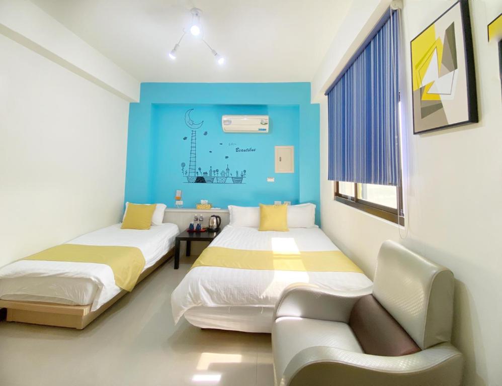 Postel nebo postele na pokoji v ubytování Yang's B&B
