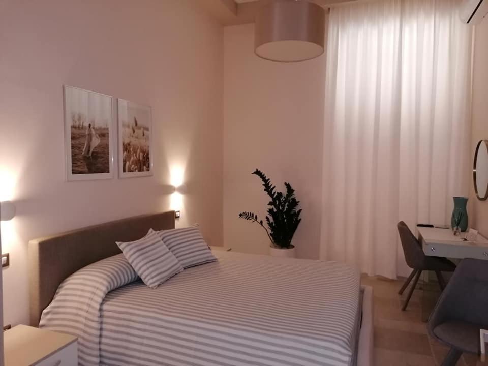 Łóżko lub łóżka w pokoju w obiekcie Lux Suite