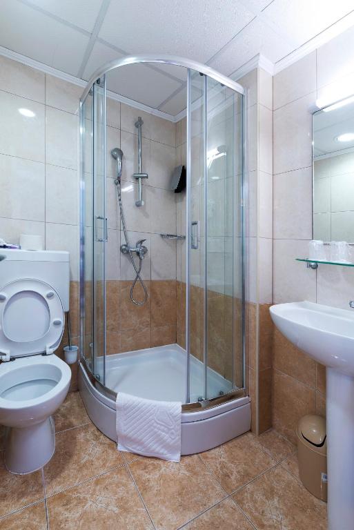 Koupelna v ubytování Hotel Perla