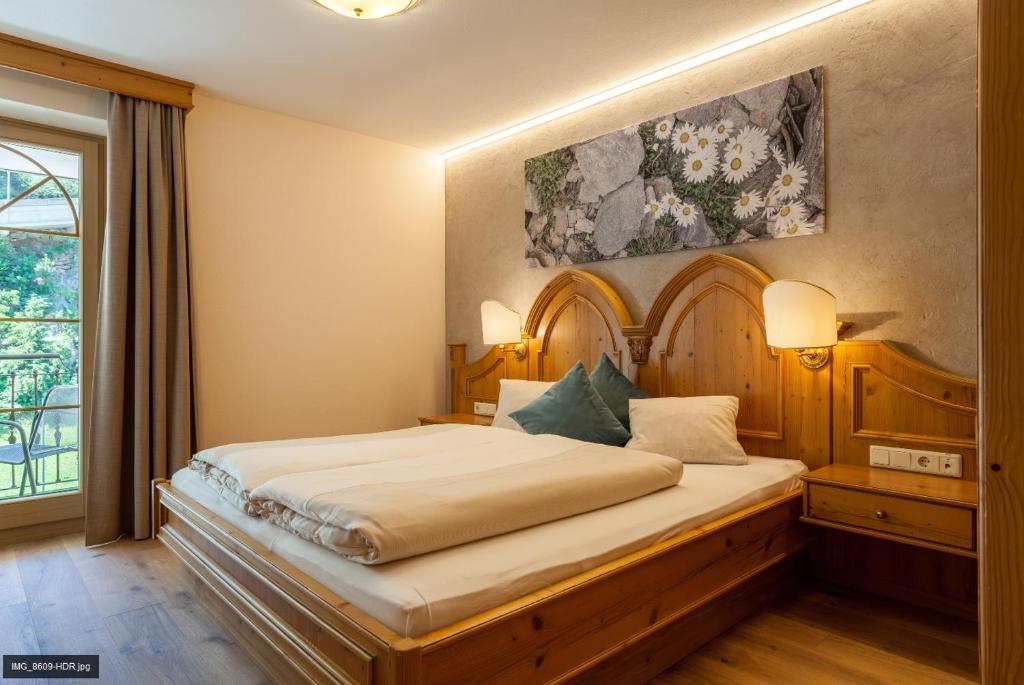 Postel nebo postele na pokoji v ubytování Top Apart Gaislachkogl