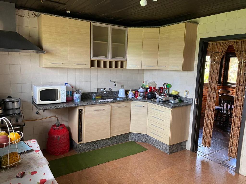  CASA COM PISCINA EM TORRES beira do rio