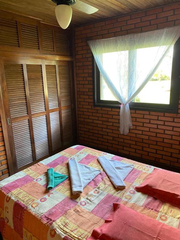  CASA COM PISCINA EM TORRES beira do rio