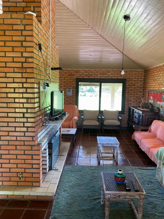 CASA COM PISCINA EM TORRES beira do rio