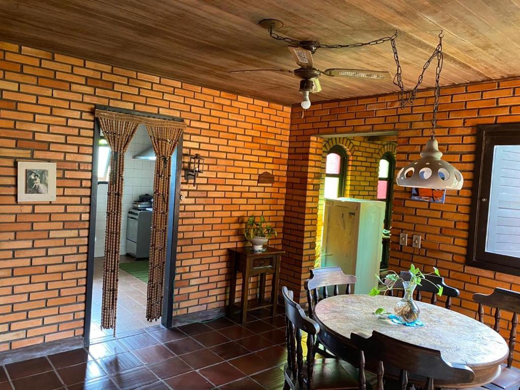  CASA COM PISCINA EM TORRES beira do rio