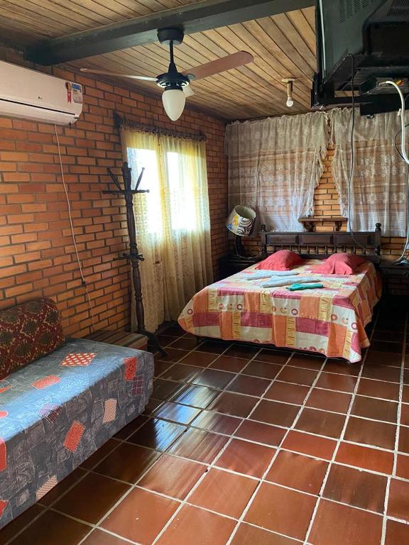  CASA COM PISCINA EM TORRES beira do rio