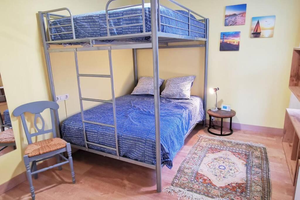 Łóżko lub łóżka w pokoju w obiekcie ¡ VAMOS A LA PLAYA 2 !