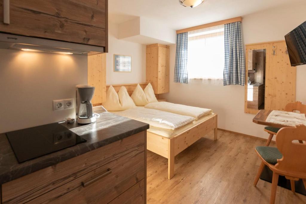 Postel nebo postele na pokoji v ubytování Appartments Jandlbauer