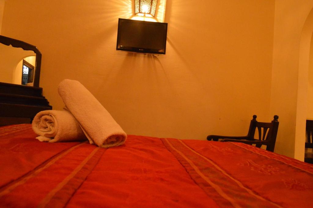 Postel nebo postele na pokoji v ubytování Hotel Amalay