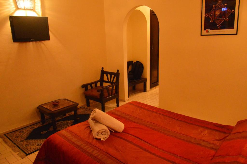 Postel nebo postele na pokoji v ubytování Hotel Amalay