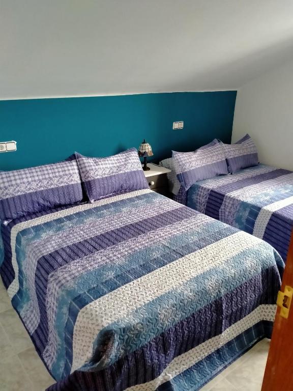 Postel nebo postele na pokoji v ubytování Vivienda uso turistico Los Nogales
