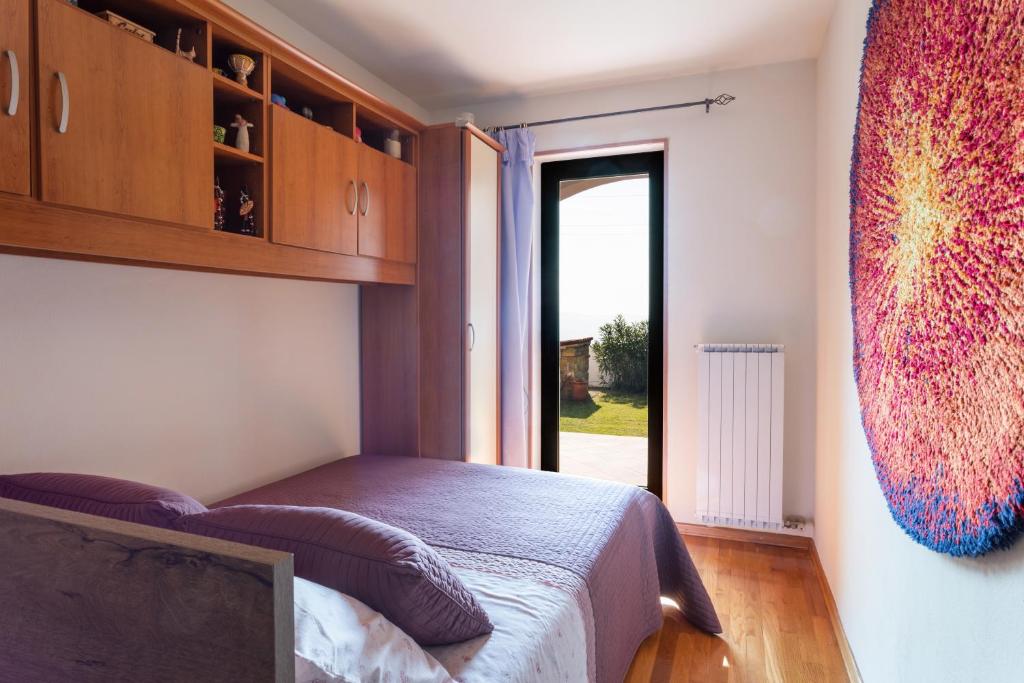 Postel nebo postele na pokoji v ubytování Villa EMI